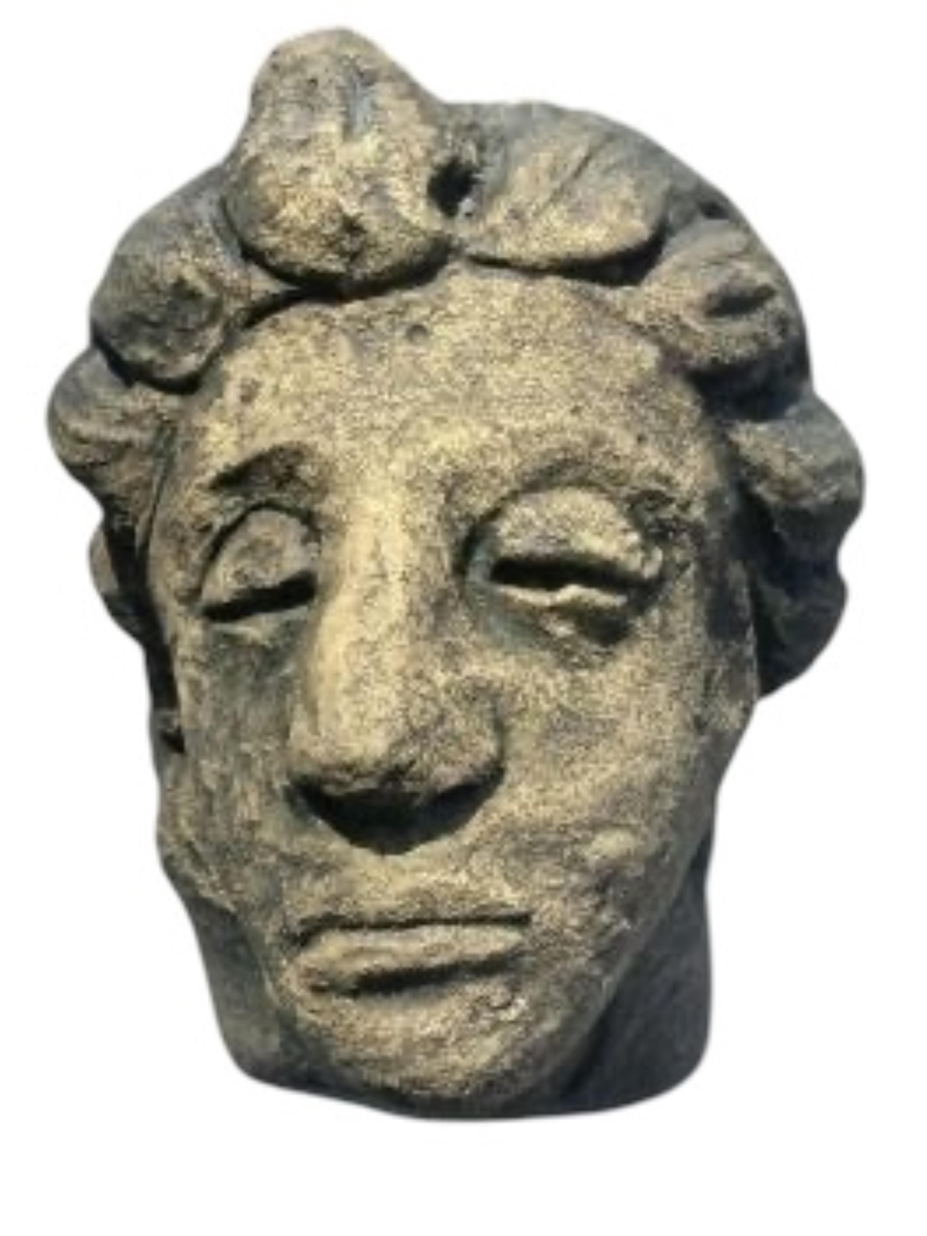 A pair of cast stone mask corbels, height 21cm